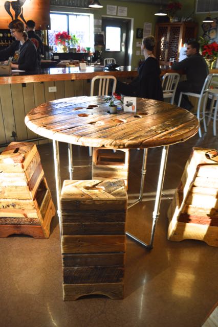 Photo of Jim's finished work in the tasting room (table and stools).