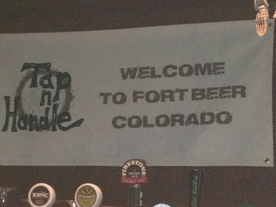 Tap and Handle bar with "Welcome to Fort Beer, Colorado" sign.