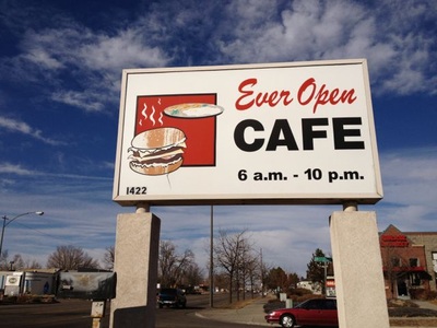 "Ever Open Cafe, 6 a.m. - 10 p.m." sign.