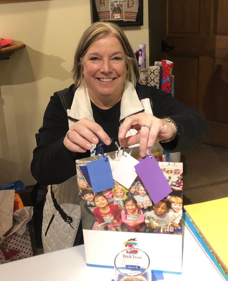 Woman showing gift tags