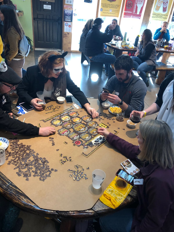People doing the puzzle.